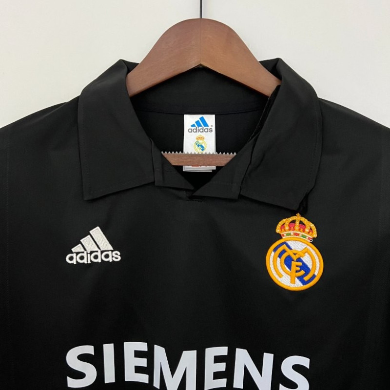 Camiseta retro Real Madrid primera 2002/2003 - ¡Triunfo histórico!